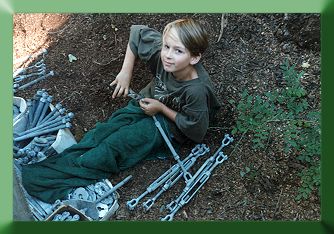 The next generation bridge builder:  Nephew Austin Thompson assembling hardware