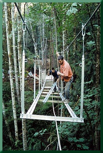 Keith and Marco hauling a stringer section into place.