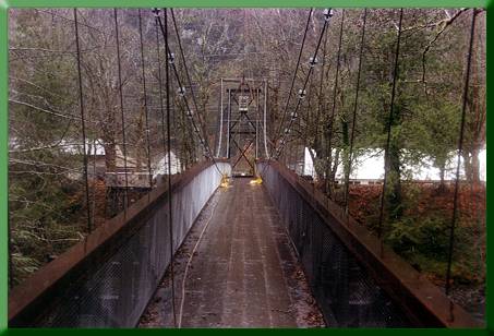 Removing the temporary mainlines prior to repairing/straightening steel chord members in truss.