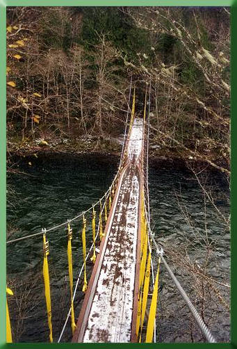 Aerial view of stabilized bridge span.