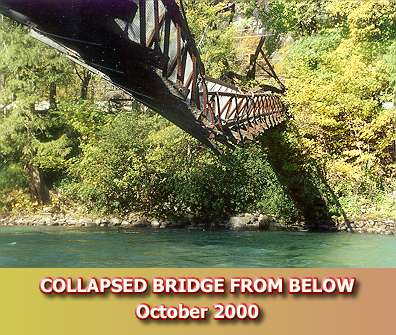 Truss sag toward river; note collapsed tower, and absence of upriver mainline..