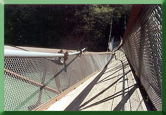 Upriver mainline draped across truss.