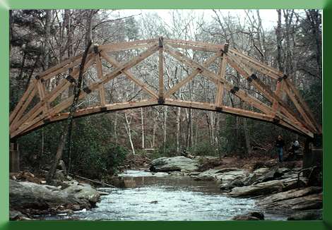 Prince William Forest Park, VA.  This crescent truss bridge design was based on a bridge concept developed by Sir Issac Newton for Cambridge University, England.