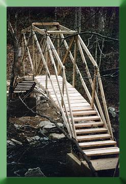 Prince William Forest Park, VA.  This crescent truss bridge design was based on a bridge concept developed by Sir Issac Newton for Cambridge University, England.
