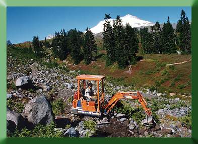 Carroll Vogel excavating with Kubota.