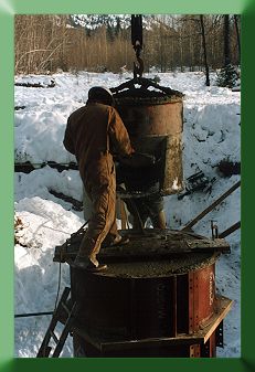 Brian Highberger pouring pylon base