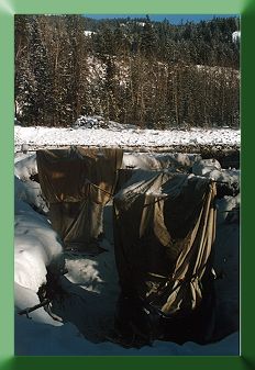 Pylons wrapped in canvas tents to prevent freezing of concrete