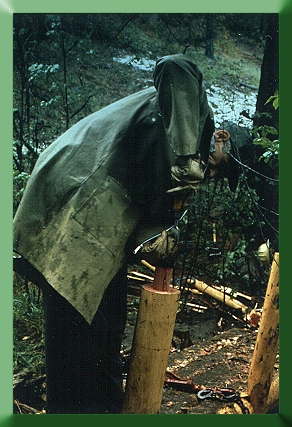 Student shaping tenon on post top for bridge on Sandia Ranger District, NM, in 1988.