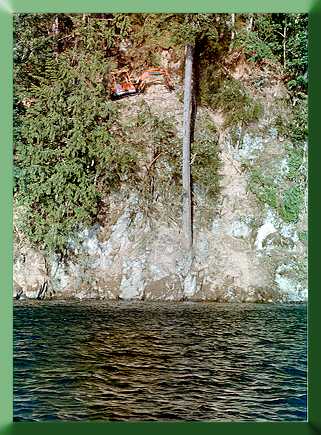 Kubota working cliff above Baker Lake.