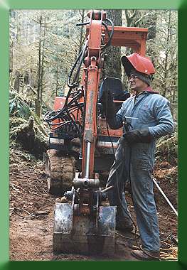 Will Turner repairing Kubota in the field:  Welding cracks in boom.