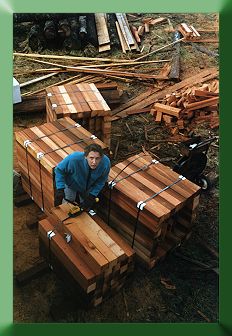 Kim Vogel strapping fresh milled railing posts.
