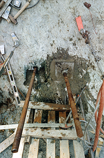 Twin anchor bolts during grouting.