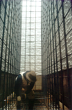 Tying rebar at the bottom of the tower abutment form.