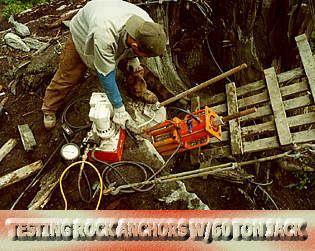 Keith Monohan testing 14' long rock anchors with 60-ton hydraulic through-jack.