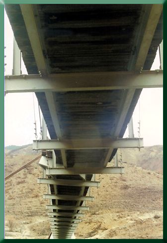 Compression buckling damage from below.