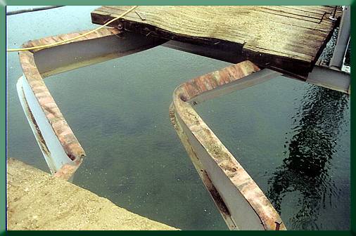 Buckled stringers after deck removal.