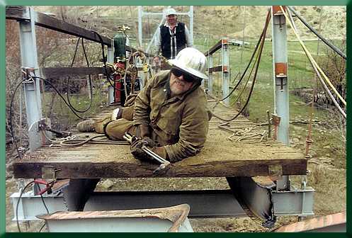 Cut loose, but still suspended.