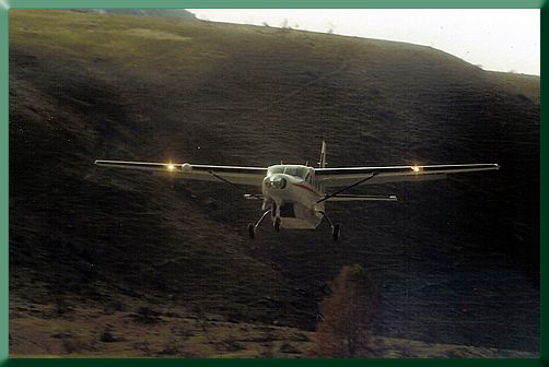 Salmon Air's Cessna Islander, inbound with gear and crew.