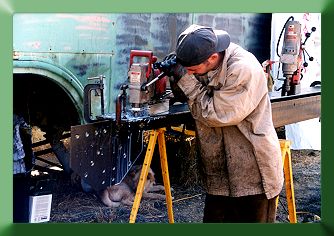 Keith Monohan fabricating new chord members.