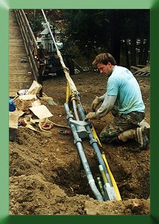 Brian Highberger attaching mainline to anchor