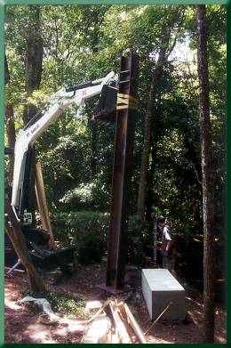 Preparing to place tower leg.