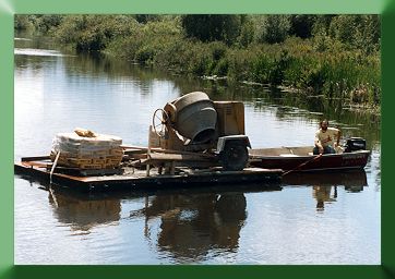 Paul Adler delivering concrete on the barge.