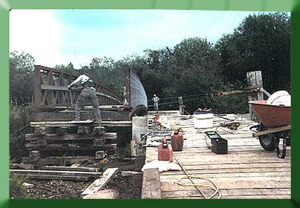 Winching bridge onto abutments