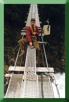 K. Monohan installing new open grip grating deck plank.