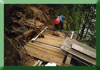 Keith Monohan installing the new tower base under the mainlines.