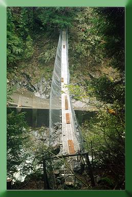 The old bridge, note boards that have been used to patch broken deck planks